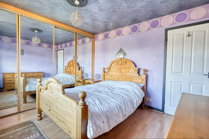 Bedroom One- click for photo gallery